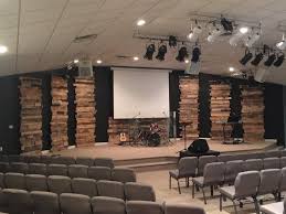 Leaning Towers Of Pallets Church Interior Design Church Design Church Foyer