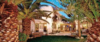 The dump is located right on the beach, within a walking distance from ritz carlton and a shopping center that has several restaurants and a grocery store with deli. Palm Beach Hotel A Beautiful Beginning To Your Holiday