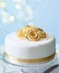 Rose gold flowers for cake. How To Make A Golden Rose Cake Topper Delicious Magazine