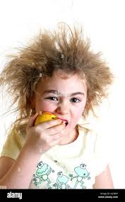 Young Girl Eating a Peach Model Released Stock Photo - Alamy