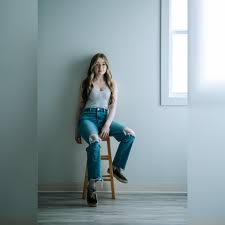 Blue eyes, freckles, simple style, and great light...what more can you ask  for?! Let Sarah know what you think, everybody!!!