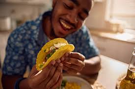 590+ Man Eating Tacos Stock Photos, Pictures & Royalty-Free Images