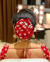 A Gorgeous Floral Bun With Rose Petals Babys Breath Bridal Hair Buns Wedding Bun Hairstyles Bun Hairstyles