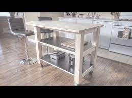 The wheels help to keep the space flexible and the design with wood panels round the side and white worktop give a very wholesome feel. How To Build A Kitchen Island On Wheels Youtube