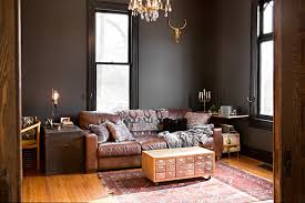 For a at ease fresh look, opt for a grey and brown lounge living room transitional formal dark wood floor living room idea in cedar rapids with gray walls a. Design Recommendation A Classic Brown Leather Sofa