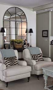 Using Mirrors To Solve Decorating Problems Living Room Mirrors Home Living Room Living Decor