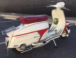 A Wolf In Sheep S Clothing 1966 Lambretta Sx200 Bike Urious Lambretta Retro Scooter Lambretta Scooter