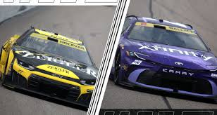 NASCAR Cup Series cars racing at Kansas Speedway