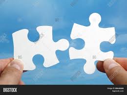 This blank template will you be able to create personalized puzzles that specifically match your students' interests or your curriculum. Holding Two Jigsaw Image Photo Free Trial Bigstock