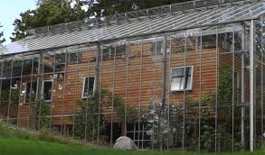 House inside greenhouse house styles home house sliding glass door outside seating area a forest of house plants plus rooflights and glass sliding doors cleverly merge the outside with the. Couple Builds Greenhouse Around Home To Grow Food And Keep Warm Off Grid World