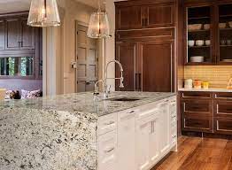 I have white laminate counters, natural light wood cabinets that are a sesame hue, white porcelain nobs on drawers and cabinets, and white appliances. Favorite Natural Granite Counters To Top Cherry Wood Cabinetry