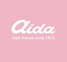 Die Aida Schreibweise Am Unternehmenslogo Aida Ist Eine 1925 Gegrundete Osterreichische Kaffeekonditoreikett Kardinalschnitte Faschingskrapfen Plundergeback
