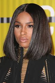 You can get this look by asking your stylist to cut your hair into a graduated bob. Ciara Straight Dark Brown All Over Highlights Blunt Cut Bob Hairstyle Steal Her Style