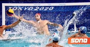 Greece survived the dismissal of captain konstantinos katsouranis to eke out a goalless draw with japan that keeps both teams in with a chance of progressing. U2zmhceek M Fm