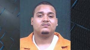 1 suspect arrested, another still wanted in Emporia police shooting