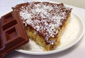 Unire lo yogurt, l'olio, il rum e. Torta Cocco E Cioccolato Con Yogurt