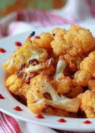 Maple Sriracha Roasted Cauliflower Recipe Vegetable Recipes Recipes Vegan Side Dishes