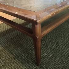 Table top is in a boomerang shape with a brass bucket accessory at its corner for chilling champagne/beverages or placing flowers and other decorative items. Mid Century Pecan Marble Coffee Table Sophisticate Line By Tomlinson Epoch