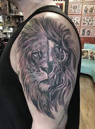 Lion Skull Tattoo On The Upper Arm Elephant Tattoos Animal Skull Tattoos Lion Tattoo
