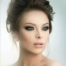 If I have black/blue dress black shoes and purse what kind of makeup should  I do and what color of lipstick and what color of nails?