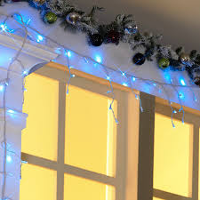 Holiday Time 200 Slow Shimmering Led Icicle Lights Blue Easy Installation Walmart Com Led Icicle Lights Icicle Lights Festive Holiday Decor