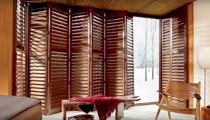 Timber Coloured Hinged Bifold Shutters On Tracks By Blindsonline Net Nz Custom Shutters Interior Shutters Full Height Shutters