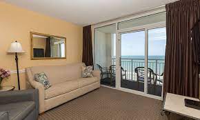 For added comfort, the suite includes one king and two queen beds, and one full sleeper sofa in the living area. Oceanfront Two Bedroom Suite Camelot By The Sea