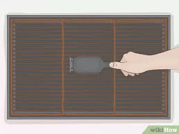 How do i clean and remove spots from my burner grates? 4 Easy Ways To Clean Rusted Grill Grates Wikihow