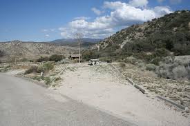 Guests enjoy the beauty of the nearby pyramid lake at the base of mountains, and the excitement of lake activities like jet skiing and wakeboarding. Pyramid Lake Los Alamos Campground Southern California Campgrounds Campsite Camping Guide