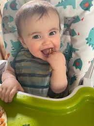 Dinner for my 9 month old this evening. Pizza wrap with tomato purée, basil  and mozzarella, cucumber, (which he loves this for his poor teeth), and a  clementine. He only has two