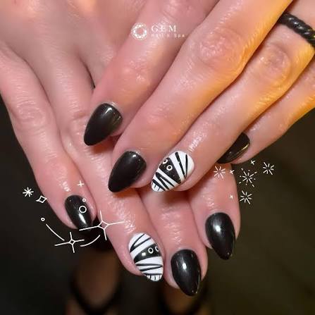 🖤✨ Mummy Chic Nails ✨🖤 Mysterious black paired with unique mummy accents  👀💅 – bold, stylish, and guaranteed to make your hands stand out in every  moment. ✨ Come to Gem Nails