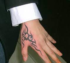 Tribal tattoos remain among the most popular tattoo choices for people nowadays. Tribal Hand Tattoos Hand Tattoos For Guys Tribal Hand Tattoos Simple Hand Tattoos