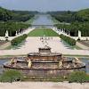 Versailles is a city on western edge of the french capital city paris , now part of the sprawling metropolis within the ile de france region. 1