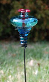 As in the spring season, birds get nectar from flowers, but we need hummingbird feeders to feed the birds in summer. Mini Blossom Hummingbird Feeder With Stake Aqua 4 Oz At Bestnest Com