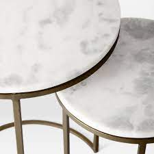 Gorgeous coffee table handcrafted from teak root with glass top natural design handmade square coffee table made from solid teak. Buy Online Marble Round Nesting Side Table Set Of 2 Now West Elm Uae