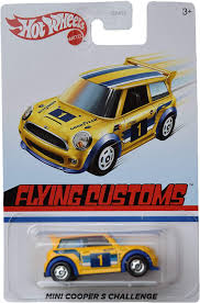 The ultimate car about town. Amazon Com Mattel Hot Wheels Mini Cooper S Challenge Yellow Flying Customs Toys Games