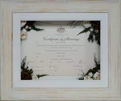 Next write in the marriage information and frame the certificate or place it in your memory book! A Beautiful Framed Marriage Certificate Surrounded By Nicole S Preserved Wedding Flowe Wedding Bouquet Preservation Wedding Certificate Wedding Bridal Bouquets