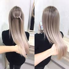 Dyeing your hair a cool gray color. Straight And Sleek Ash Blonde Ombre Blondeombre Hair Styles Stylish Hair Ash Blonde Hair Colour