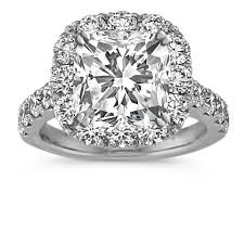 The engagement ring features 1 carat cushion cut moissanite full of sparkle and beauty and is made in solid 10k white gold. Cushion Halo Engagement Ring With Round Diamond Accent In 14k White Gold Shane Co