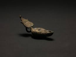 Fine ancient roman empire footed bronze oil lamp with two chains with loop for hanging, crecent moon type handle with suspension loop. Roman Bronze Oil Lamp Medusa Ancient Art