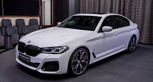 2021 Bmw M550i Matches Alpine White Body With Mocha Interior Carscoops