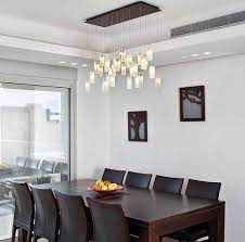 Whether you want your dining room to be elegant and formal or cozy and friendly, modern dining room lighting fixtures can be used to complete the ambiance. Dining Room Lighting Ideas And The Arrangement Tips Home Interiors Dining Room Lighting Contemporary Dining Room Lighting Modern Dining Room