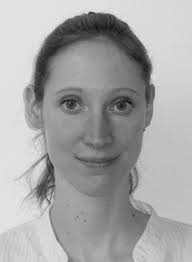 High-frequency (20 to 40 MHz) acoustic response of liquid-filled  nanocapsules