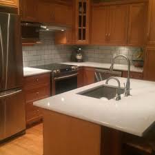 Traditional To Transitional Ironsbridge Cambria Quartz Honey Oak Cabinets Stainless Steel Brushed Nickel Truffle Honey Oak Cabinets Oak Cabinets Honey Oak