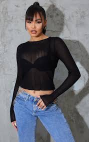 A few stray strings here and there but not too much of a problem. Black Sheer Knitted Bust Detail Long Sleeve Top Prettylittlething Il