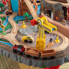 A crane lifts and lowers cargo onto the train and a helicopter soars over the. Amazon Com Kidkraft Waterfall Junction Wooden Train Set Table With 4 Storage Bins Toy Playsets Gift For Ages 3 Toys Games