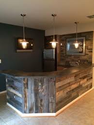 A mix of natural materials — stone columns, marble countertop, leather barstools and richly finished wood — makes this basement bar a showpiece. 43 Insanely Cool Basement Bar Ideas For Your Home Homesthetics Inspiring Ideas For Your Home