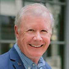 Russ H. Reed, BSc. Dip. Ed, Grad. Dip. Inst. Administration, MA