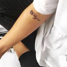 A Simple Elegant Rose Tattoo Couldn T Be Prettier On The Arm See Even More Delicate Rose Tattoo Ideas For Women Right Tattoos Small Rose Tattoo Cute Tattoos