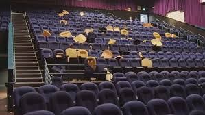 A woman waits for news outside gateway high school, a few blocks from the scene of the shooting at the photos: Images Show The Aftermath Of Deadly Colorado Cinema Shooting Youtube